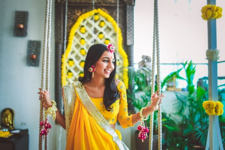 A Spectacular & Stylish Goa Wedding Of Childhood Sweethearts! | Bride  photos poses, Bridal photography poses, Haldi ceremony outfit