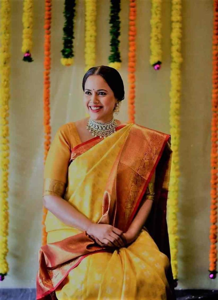 Bright yellow banarasi silk saree for the haldi