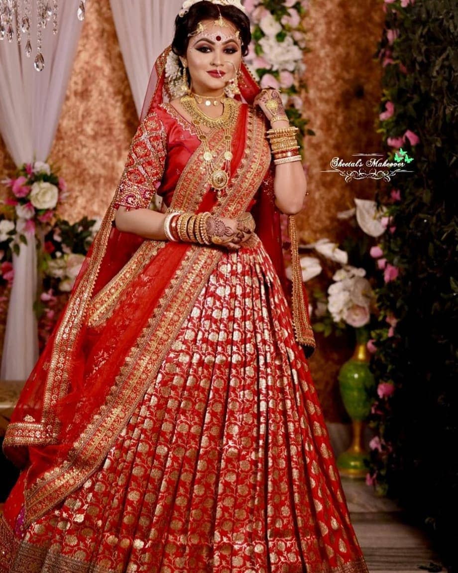 Bengali Bride wearing Red Banarasi Dream Lehenga