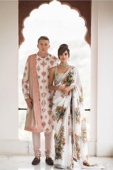 Diipa Khosla opted for this Sabyasachi White elegant saree with green and orangy print