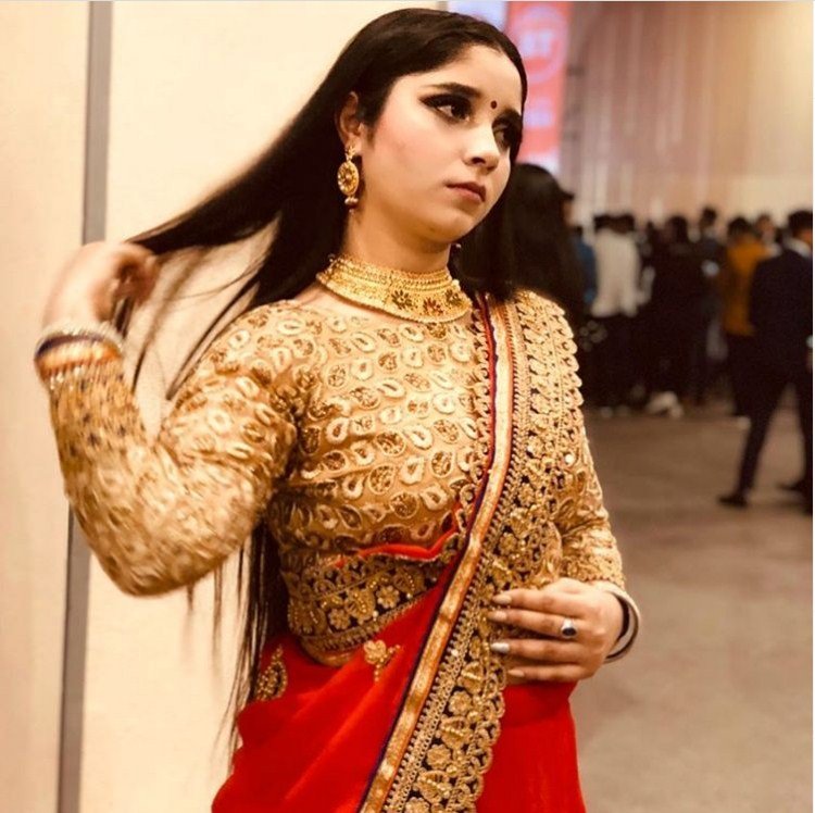 Golden Blouse with Red Saree
