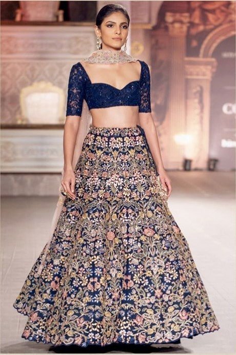Florals in pink and yellow over the ocean deep blue Lehenga