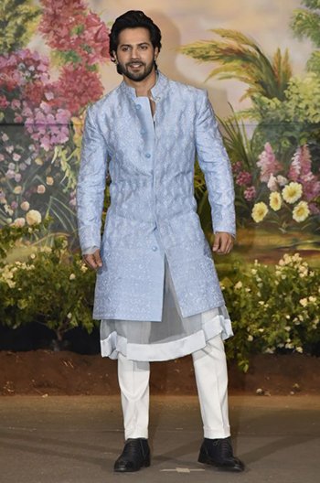 Varun Dhawan looks really handsome in this shiny powder blue achkan
