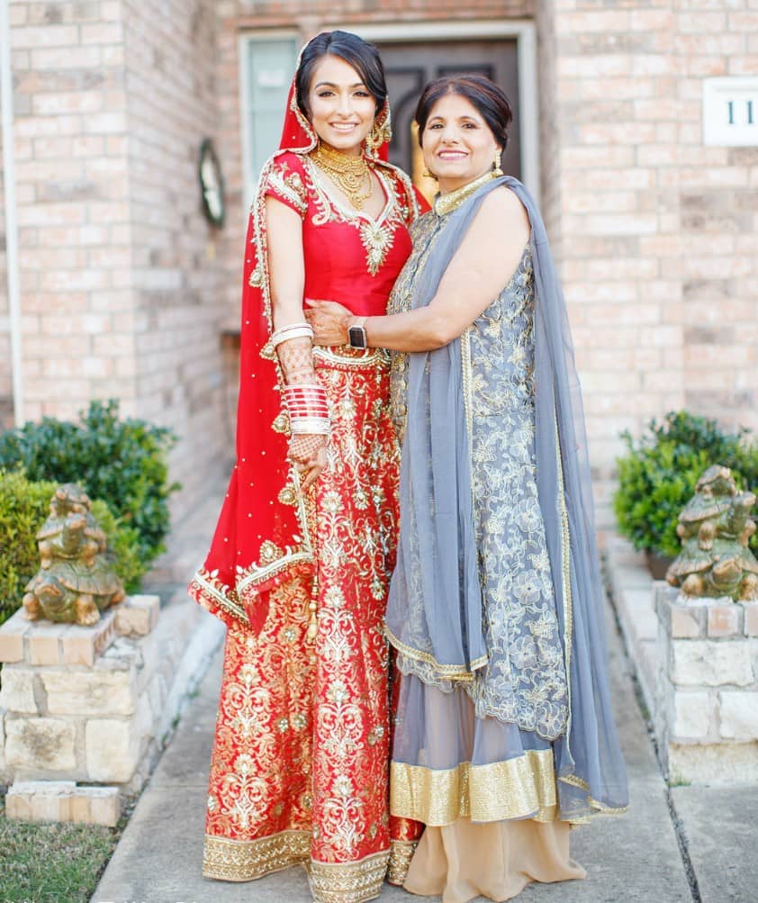 Punjabi bridal lehenga in red color with golden borders and gota patti work