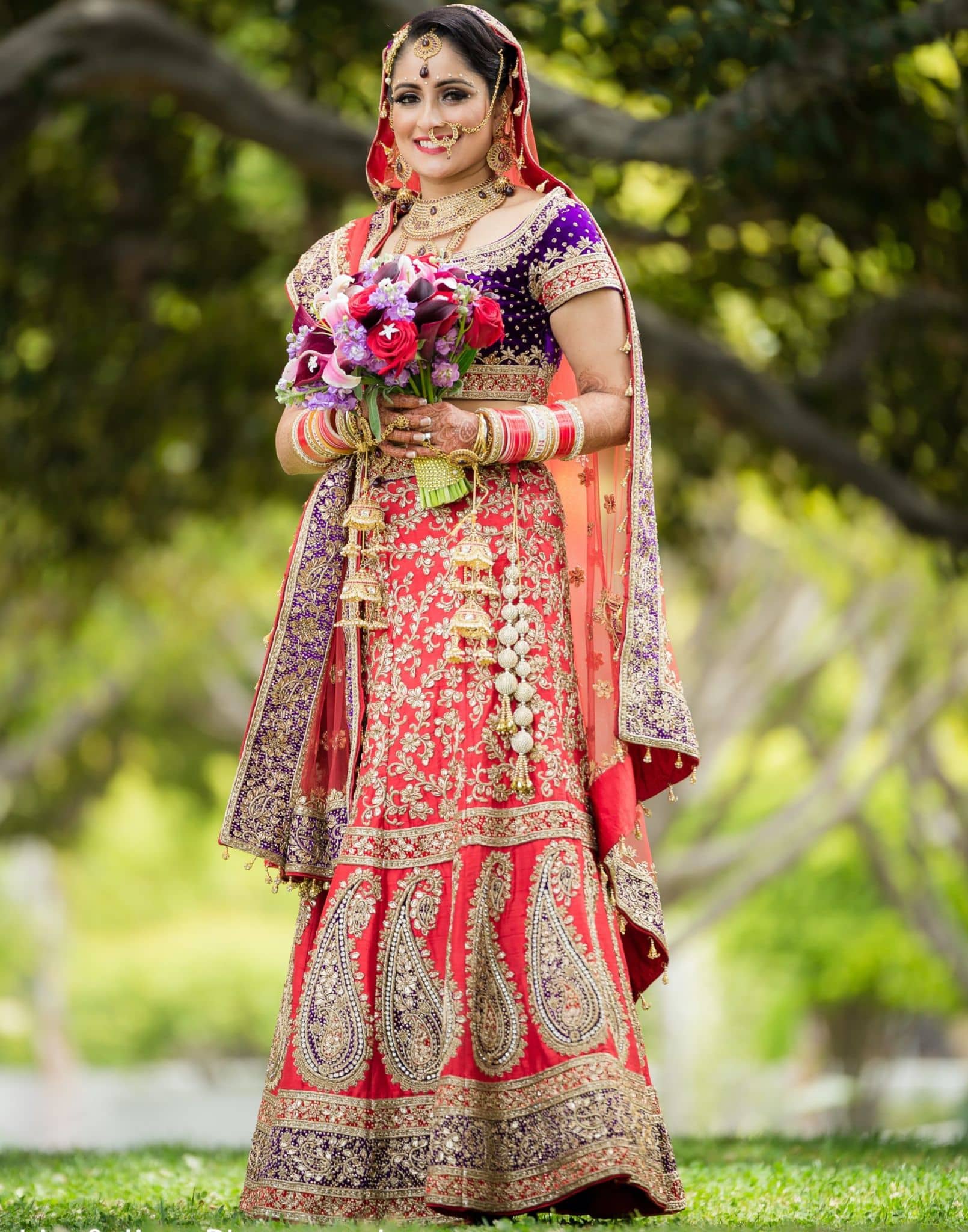 Bold and dramatic bridal lehenga in purple and blush color