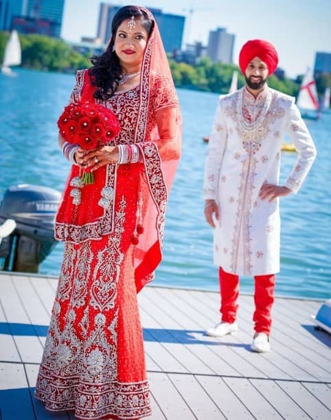 Fish cut Punjabi bridal lehenga in red with silver embroidery work