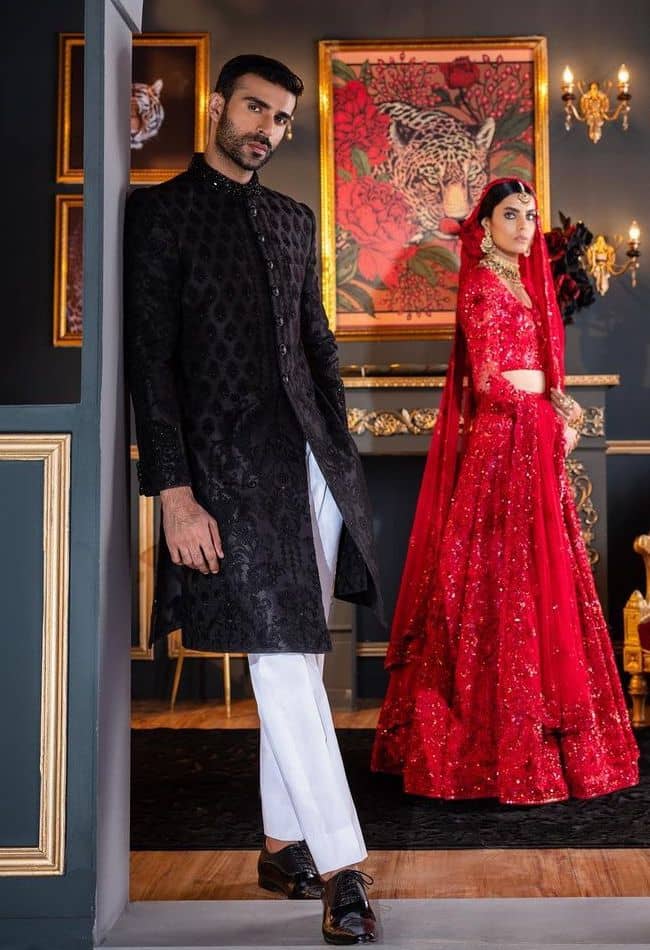 Completely embroidered black sherwani with black buttons