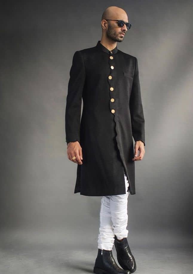 Front slit long style black sherwani with white churidar