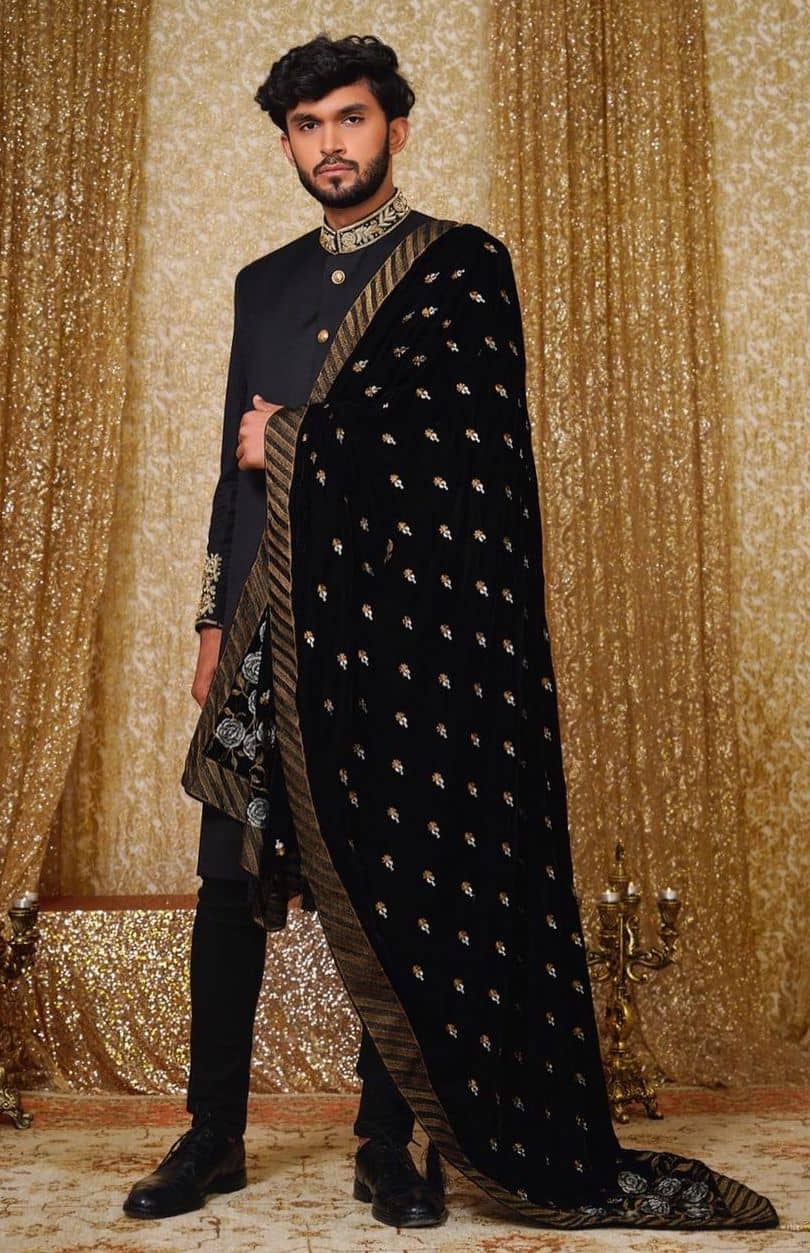 Lavish black sherwani with a shawl