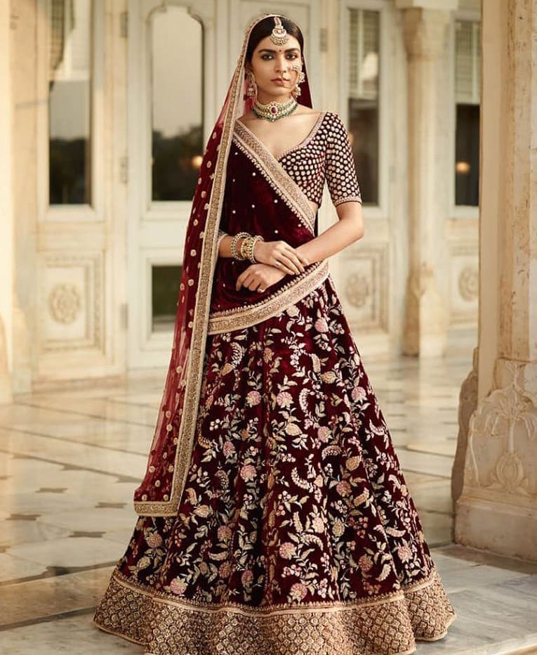 Ethnic, bridal wear in royal maroon color