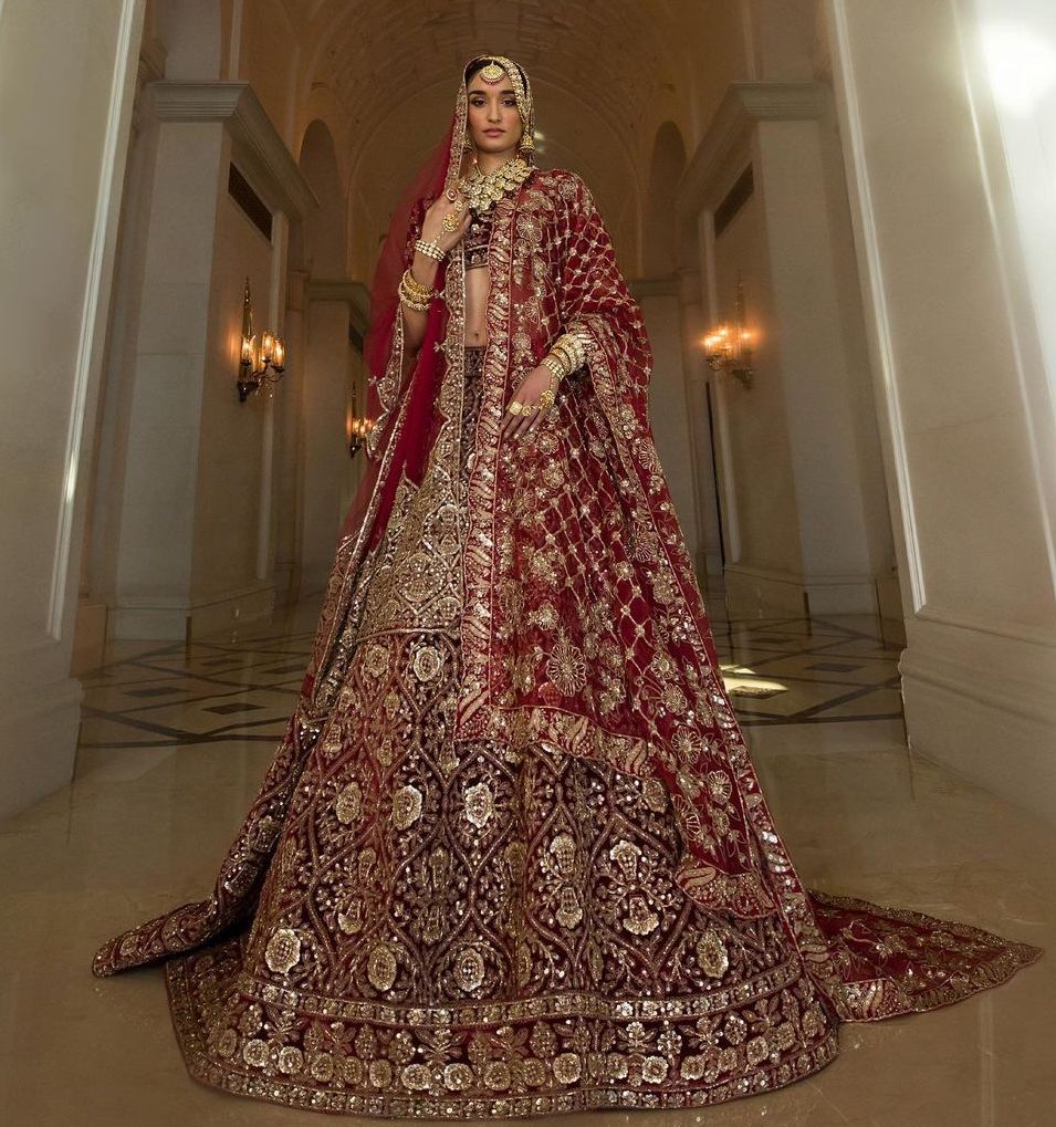 Awadhi regal style bridal lehenga in maroon color