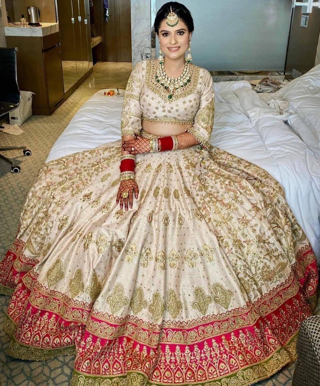 Red Green and Gold in white lehenga 