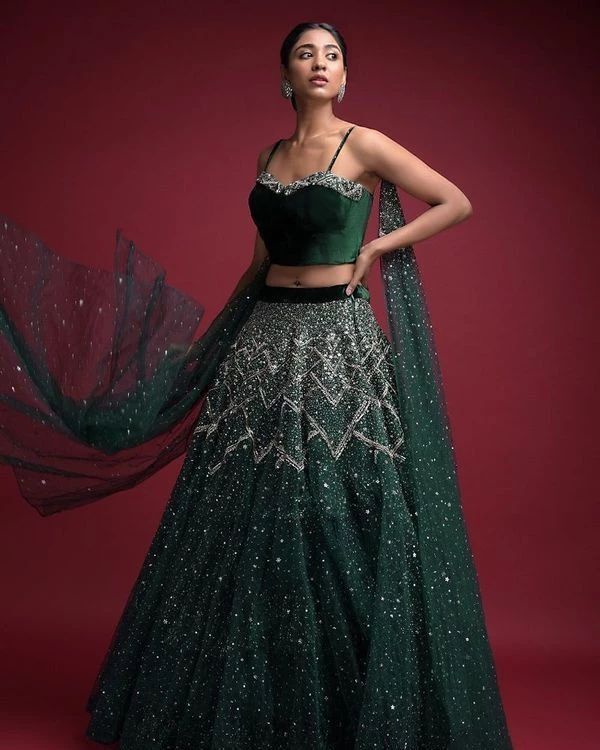 Beautiful Bottle green Lehenga-Choli. Embellished with hand embroidery  work. Paired with net dupatta. … | Indian wedding outfits, Function  dresses, Green lehenga