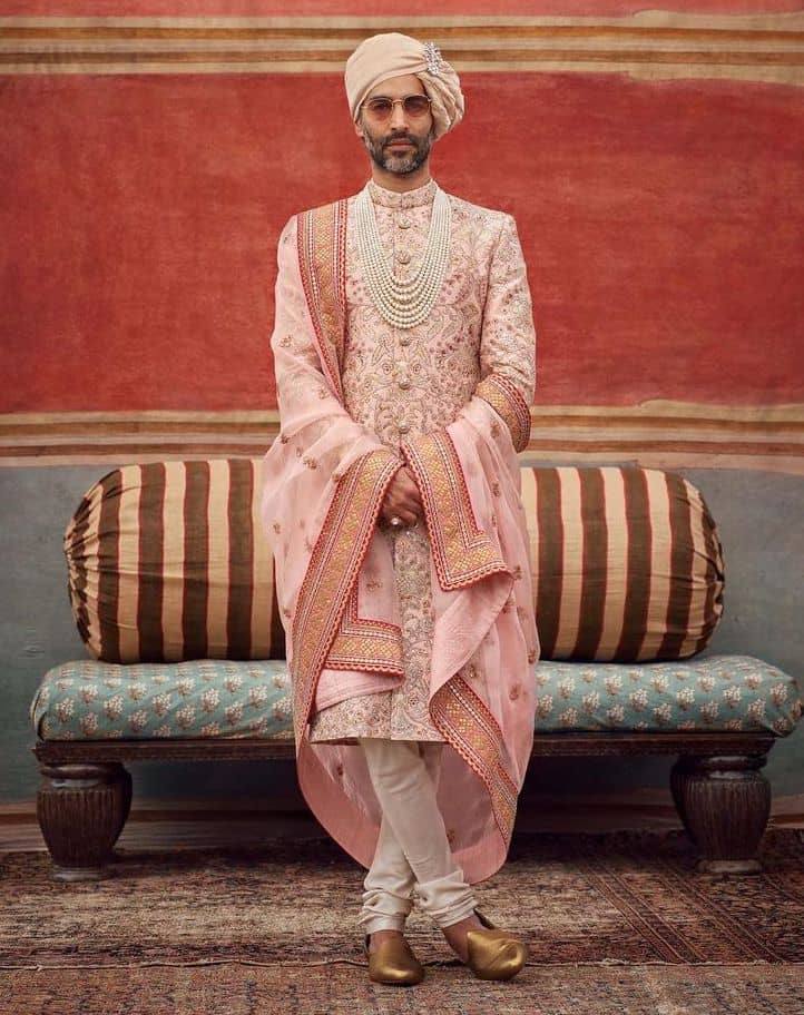 The Romance of Pink and Gold in sherwani