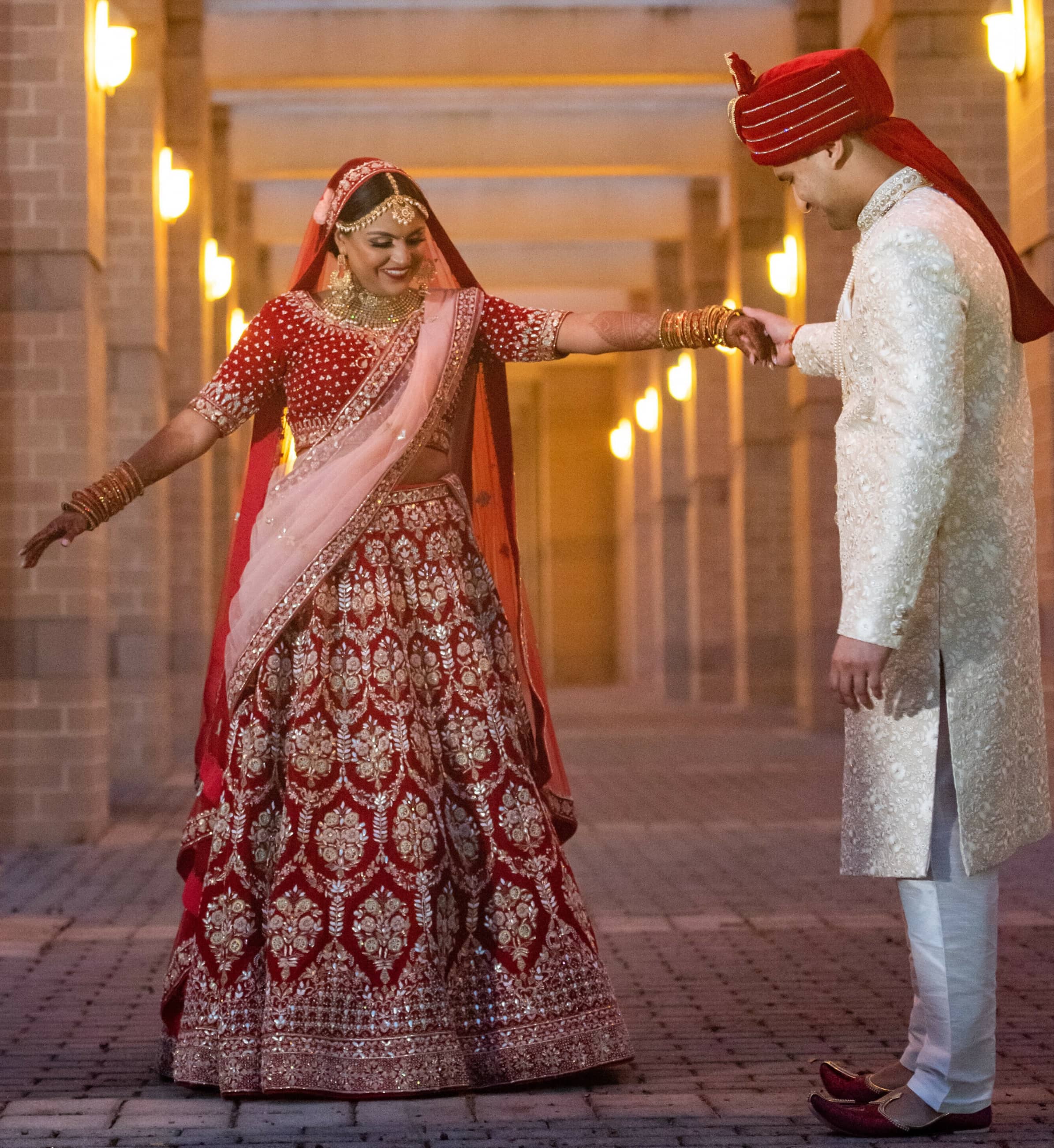 Red lehenga and Pink Sherwani - Indian Couple getting Married in USA
