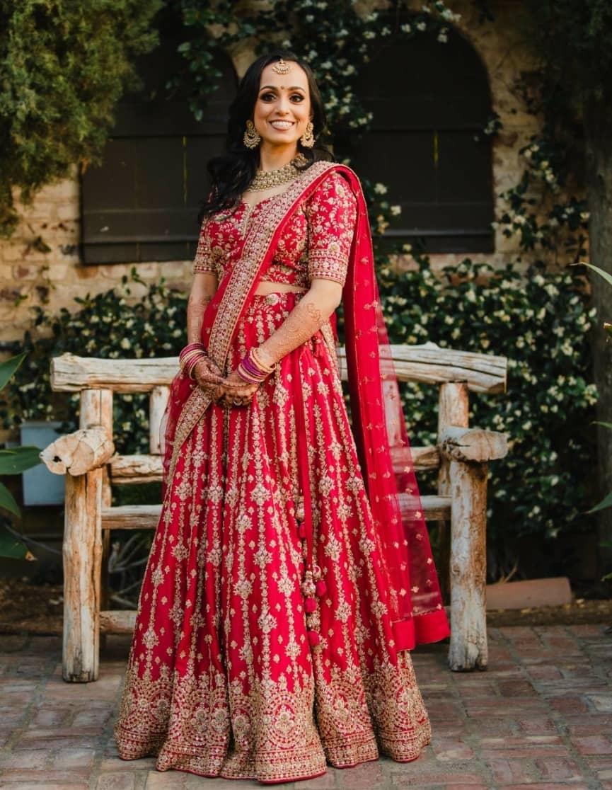 More Red and Gold Lehengas