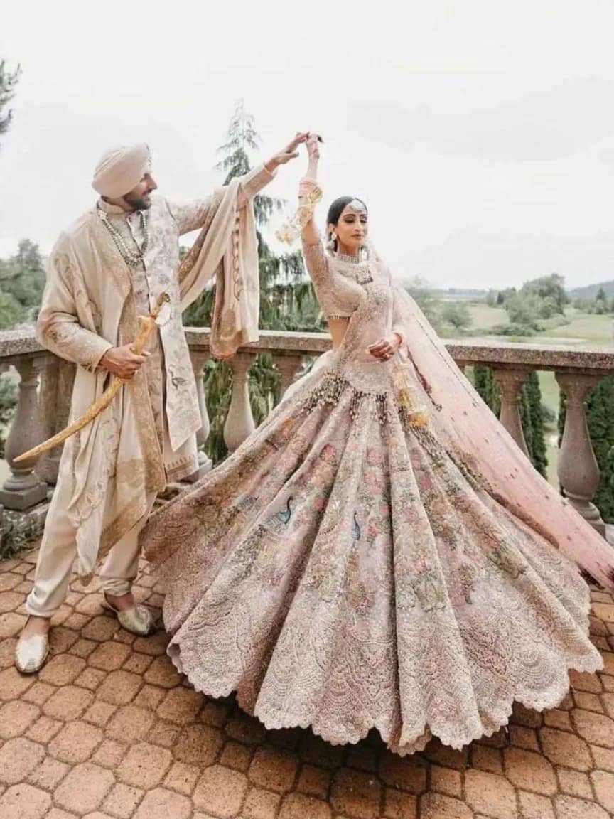 22 Matching Lehenga & Sherwani for Indian Brides & Grooms | Couple wedding  dress, Indian wedding couple photography, Wedding couple poses
